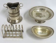 A silver plated wine bottle stand twinned with a large plated toast rack, a silver plated basket & a