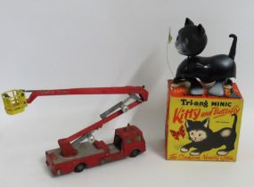 A vintage boxed Tring Minic clockwork Kitty cat wi