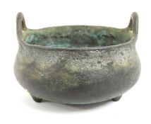 A small Chinese bronze censer, 65mm wide