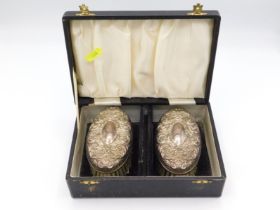 A boxed set of Birmingham silver mounted clothes b