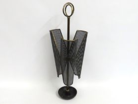 A mid 20thC. Mathieu Matégot style umbrella stand,