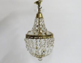 A decorative brass mounted crystal lamp shade, 420