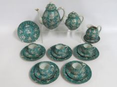 A Japanese porcelain tea set with sugar bowl & cre