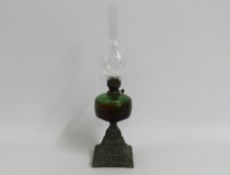 A 1920's art deco style French oil lamp with green