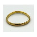 A 22ct gold band, somewhat misshapen, 2.8g, size S