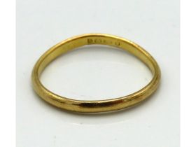 A 22ct gold band, somewhat misshapen, 2.8g, size S