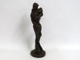 An unsigned contemporary bronze depicting two love