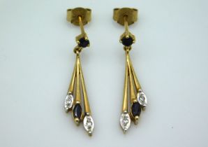 A pair of 9ct gold drop earrings set with sapphire