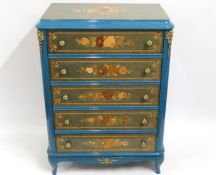 An Italianate style chest of drawers with inlaid d