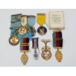 A quantity of Masonic medallions including one sil