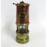 A Lamp & Limelight Co. brass & copper miners lamp,