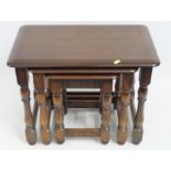 An oak nest of tables by Priory, largest 618mm wid