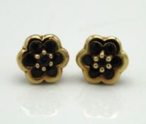A pair of 9ct gold earrings set with floral arrang