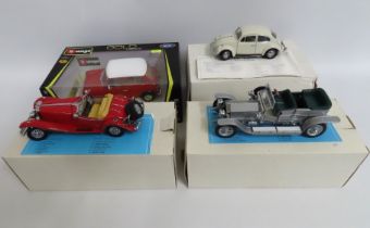 A Burago 1:18 1969 Mini Cooper twinned with a 1967