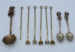 An .800 silver gilt spoon of organic design, two .