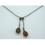 A 1920's .800 silver pendulum necklace with agate style stones