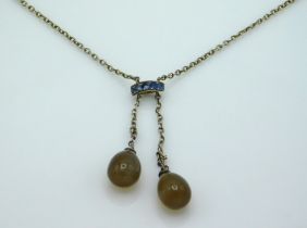 A 1920's .800 silver pendulum necklace with agate style stones