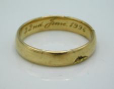 A 9ct gold band, engraved inside 22nd June 1996, small area of damage, 3.9g, size T