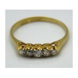 An 18ct gold five stone diamond ring, approx. 0.2c