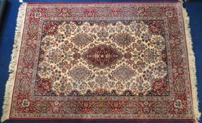A Persian Kashan style wool carpet, 2140mm x 1430m