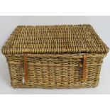 A large wicker trunk, 750mm x 550mm x 370mm