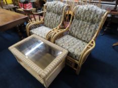 A cane conservatory suite comprising two chairs &