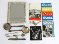 A photo frame, several pieces of plated ware, five