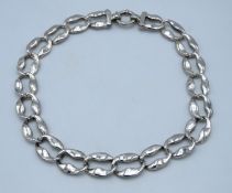 A large sterling silver oversized curb link neckla
