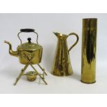 A brass spirit kettle, a brass jug & a trench art