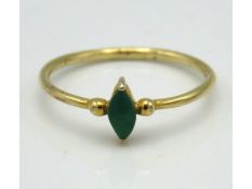 An antique yellow metal ring set with turquoise, t
