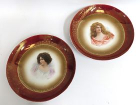 A pair of antique Austrian Vienna style wall plate