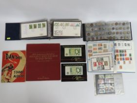 A quantity of stamps, forty first day covers & alb