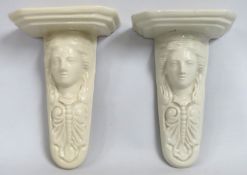 Two similar pottery wall sconces with masks, one stamped G. H. Till with firing cracks, approx. 196m