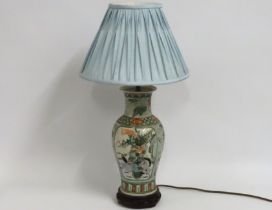 A decorative lamp with Chinese porcelain vase base