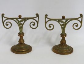 A pair of arts & crafts style bronze & brass andirons, approx. 223mm high x 200mm wide £20-30