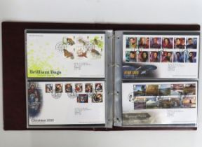 A Royal Mail album of first day covers, approx. 50