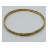 A 9ct gold metal core bangle, 17.4g inclusive, 79m