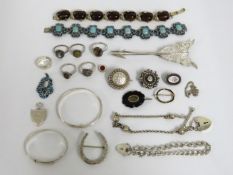 A quantity of silver & white metal costume jewelle