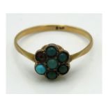 An antique 9ct gold 'daisy' ring set with turquois