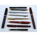 Nine ball point pens including Parker & Papermate