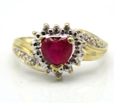 A 10ct gold ring set with diamonds & a heart shape