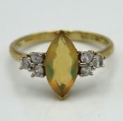 A 9ct gold ring set with diamond & marquise cut wa