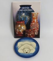 A Dennis Chinaworks Polar Bear plaque with catalog