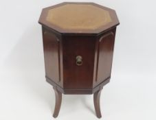 A Strongbow low level octagonal mahogany drinks ca