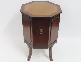 A Strongbow low level octagonal mahogany drinks ca