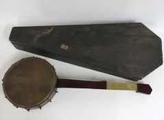 A cased banjo, a/f, maker possibly H. Spratt