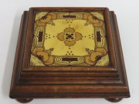 A walnut mounted Minton tile pot stand, 225mm x 22