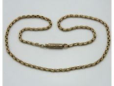 An early 20thC. yellow metal chain, tests electron