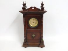 A Waterbury Clock Co. mantle clock, 535mm tall