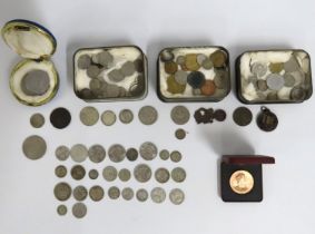 A quantity of pre-1946 UK coinage, 146.4g, a West Wheal Cornish token, a 1830 Seikh Empire and 1960